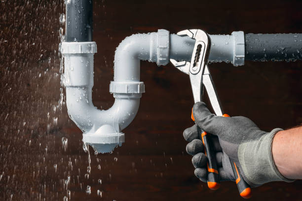 Professional Emergency Plumber technician working in Leominster, MA